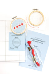 Components of kit for stitching embroidered Chicago flag tree ornament