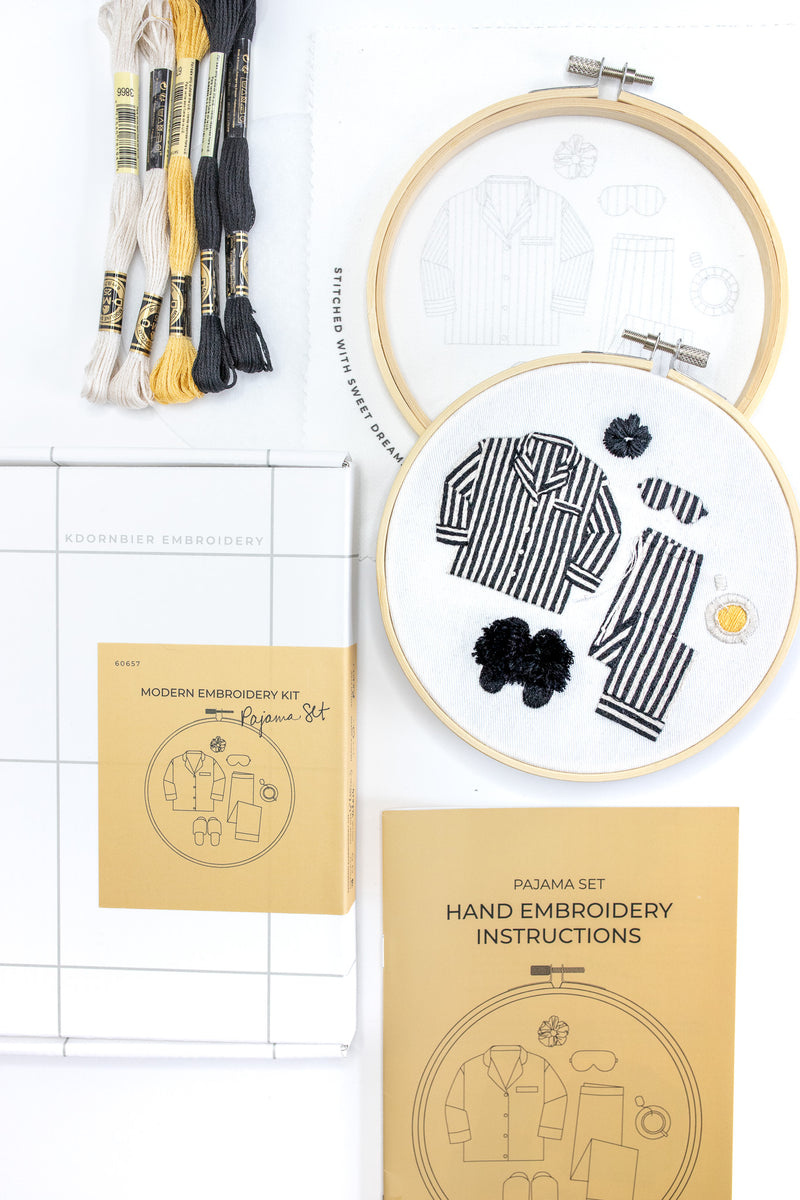 Components for embroidering striped black and white pajamas